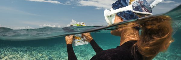 Caitlin Rentell surveying coral